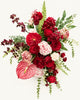 Détail des fleurs rouges, roses et blanches de la composition florale